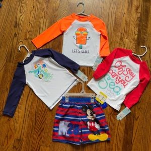 NWT 2T rash guards and trunks